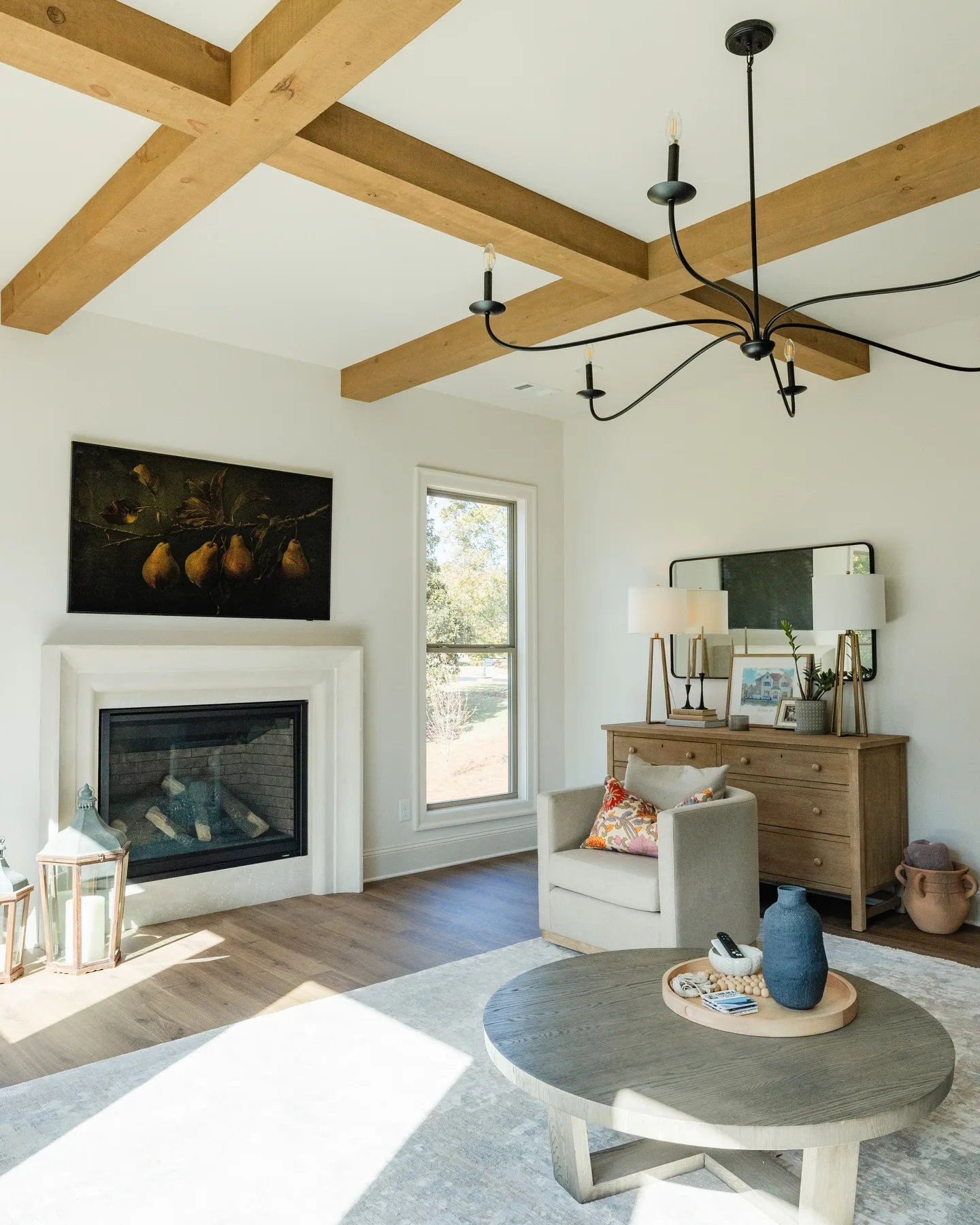 Bright, airy, and full of character—this living room features stunning wood beams, stylish lighting, and durable flooring built for everyday living. Add in a cozy fireplace and abundant natural light, and you’ve got the perfect North Georgia retreat.

Ready to build your dream home? Head to the link in bio today to get started with us. 

#NorthGeorgiaHomes #HomeBuilderGA #LivingRoomGoals #CustomHomes #SouthernLiving

Interior Design: @hawkinsandgraydesign 
Flooring: @hillmanflooring 
Photography: @lyndseymariephotography