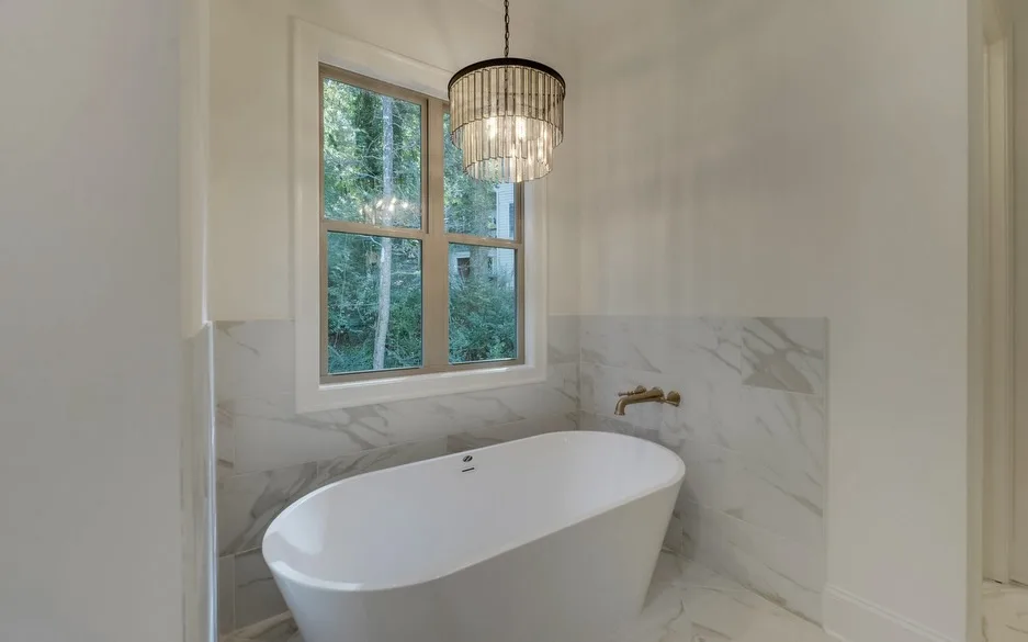 Every detail in this luxury bath was designed to feel like a private retreat. 🌿

From the dramatic marble finishes and spa-inspired soaking tub to the warm designer lighting and custom cabinetry, this space blends timeless elegance with everyday comfort.

Ready to build a home that reflects your style and the way you live? Visit our link in bio and let Southernwood Homes bring your vision to life. 🏡

#NorthGeorgiaHomes #LuxuryHomeBuilder #GeorgiaCustomHomes #NorthGeorgiaLiving #DreamHomeDesign