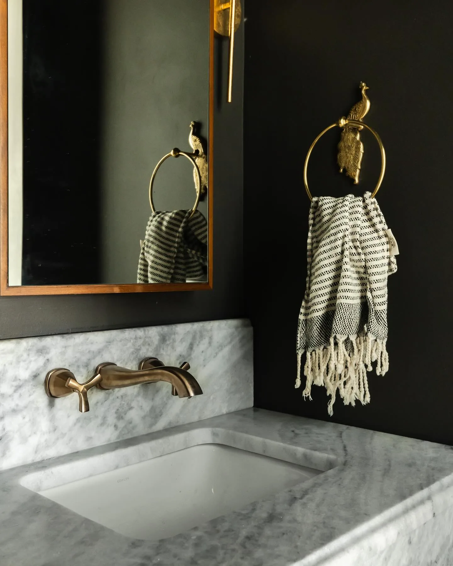 Feeling bold? The powder bath is a great place to add bold features, like a moody wall color, gorgeous sconces, or a unique sink and faucet. This powder bath is absolutely stunning! ⭐️🩶

Visit our link in bio to see more of our work and fill out the contact form so we can talk to you about building the home of your dreams!

#southernwoodhomes #custombuild #luxuryhomes #NorthGeorgiaHomes #HallCountyGA

Interior Design: @hawkinsandgraydesign 
Photography: @lyndseymariephotography