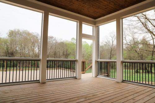 covered screened porch | Sundeck | Outdoor Living Space Photos of Custom Homes Built By Southernwood Homes | Custom Home Builder Northeast Georgia