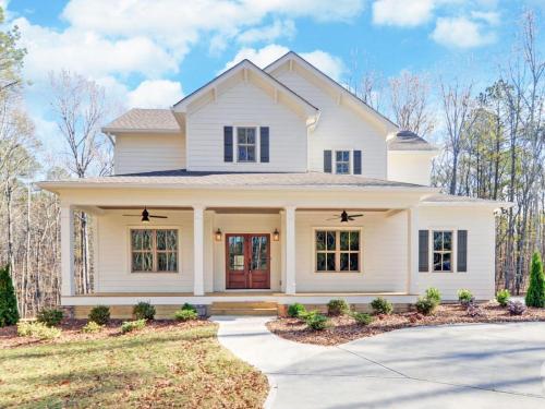 2-Story White Modern Farmhouse | All White Siding Exterior | Large From Porch with Lapboard Ceiling. | North Georgia New Home Construction