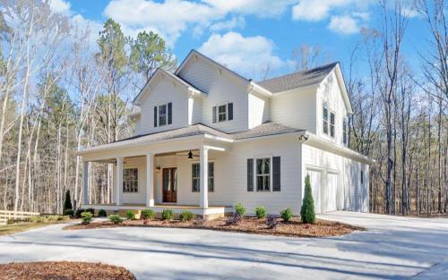 2-Story White Modern Farmhouse | All White Siding Exterior | Large From Porch with Lapboard Ceiling. | North Georgia New Home Construction